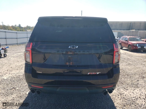 2023 Chevrolet Suburban RST with VIN 1GNSKEKL7PR237198, listed as a Copart auction lot 75116764 with 71,908 mi miles and Salvage Title. Bid and sale history available at carsss.com. Image 6.