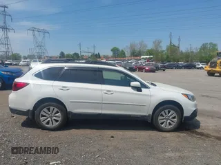 2016 Subaru Outback 2.5i Premium with VIN 4S4BSADC1G3202007, listed as a IAAI auction lot 42106507 with 63,046 mi miles. Bid and sale history available at carsss.com. Image 13.
