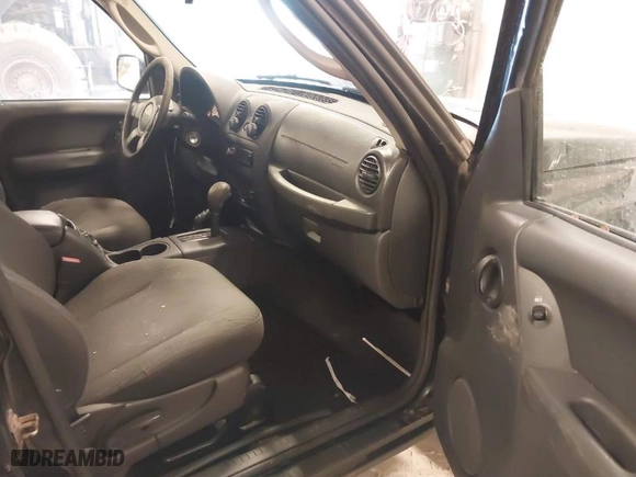 2004 Jeep Liberty Sport with VIN 1J4GL48K44W221827, listed as a IAAI auction lot 41691349 with 157,642 mi miles. Bid and sale history available at carsss.com. Image 5.
