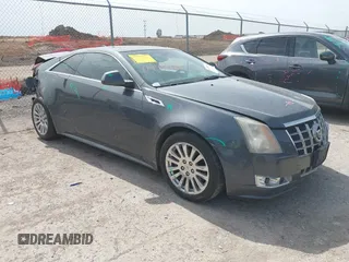 2012 Cadillac CTS Premium z VIN 1G6DP1E37C0137398, wystawiony jako IAAI lot #41744461 z przebiegiem 159 974 mil mil oraz . Historia ofert i sprzedaży dostępna na DreamBid. Obrazek 1.