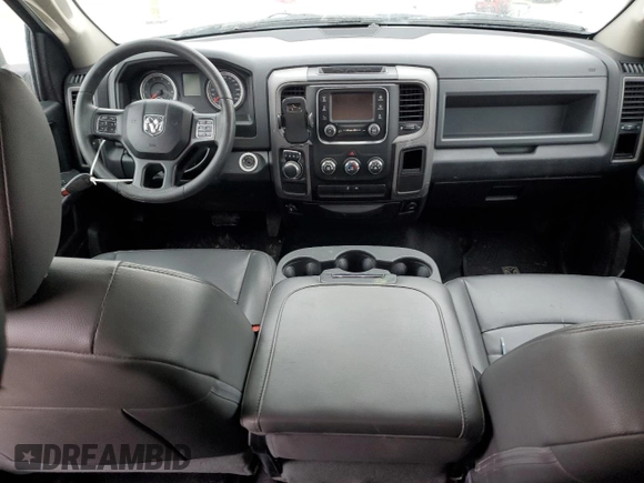 2018 Ram 1500 Express with VIN 1C6RR6FG1JS127115, listed as a Copart auction lot 43017055 with 87,487 mi miles and Salvage title. Bid and sale history available at DreamBid. Image 8.