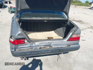 1993 Mercedes-Benz E Class with VIN WDBEA32E2PB950631, listed as a IAAI auction lot 41835262 with 155,114 mi miles. Bid and sale history available at carsss.com. Image 13.
