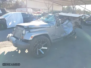 2013 Jeep Wrangler Unlimited Sport with VIN 1C4BJWDG0DL618696, listed as a IAAI auction lot 41146315 with 1 mi miles. Bid and sale history available at carsss.com. Image 16.