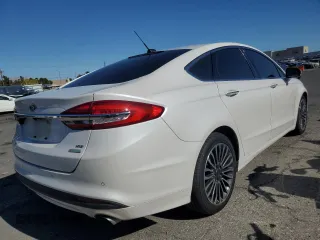 2017 Ford Fusion SE with VIN 3FA6P0HD0HR247730, listed as a Copart auction lot 56564595 with 137,944 mi miles and Clean Title. Bid and sale history available at DreamBid. Image 3.