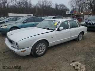1998 Jaguar XJ with VIN SAJHX1247WC841164, listed as a Copart auction lot 44326455 with 0 mi miles and Salvage Title. Bid and sale history available at carsss.com. Image 1.