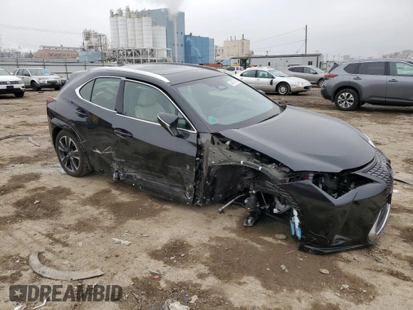 2025 Lexus UX with VIN JTHUCJDH5S2003058, listed as a Copart auction lot 43457505 with 1,239 mi miles and Salvage Title. Bid and sale history available at carsss.com. Image 4.