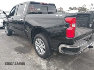 2024 Chevrolet Silverado 1500 LTZ with VIN 1GCUDGEL3RZ105870, listed as a IAAI auction lot 41681311 with 7,421 mi miles and . Bid and sale history available at DreamBid. Image 3.