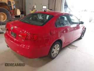 2014 Volkswagen Jetta SE z VIN 3VWD17AJ5EM249216, wystawiony jako IAAI lot #42096885 z przebiegiem 188 166 mil mil oraz . Historia ofert i sprzedaży dostępna na DreamBid. Obrazek 4.