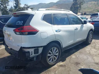 2019 Nissan Rogue SV with VIN JN8AT2MT4KW255007, listed as a IAAI auction lot 42066613 with 106,699 mi miles and . Bid and sale history available at DreamBid. Image 4.