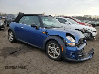 2014 MINI Convertible with VIN WMWZN3C53ET861225, listed as a Copart auction lot 87791665 with 104,151 mi miles and Salvage title. Bid and sale history available at DreamBid. Image 4.