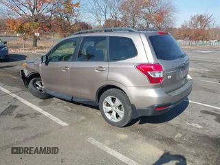 2015 Subaru Forester 2.5i Premium with VIN JF2SJADC4FH409078, listed as a IAAI auction lot 40731696 with 171,874 mi miles. Bid and sale history available at carsss.com. Image 3.