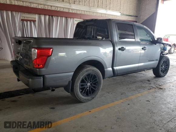 2018 Nissan Titan SV with VIN 1N6AA1E57JN515817, listed as a Copart auction lot 65537205 with 69,567 mi miles and Salvage title. Bid and sale history available at DreamBid. Image 3.