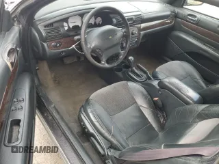 2004 Chrysler Sebring Limited z VIN 1C3EL65R74N181053, wystawiony jako Copart lot #57616835 z przebiegiem 90 898 mil mil oraz Szkoda całkowita • Salvage title. Historia ofert i sprzedaży dostępna na DreamBid. Obrazek 8.