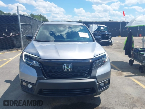 2021 Honda Passport Sport with VIN 5FNYF7H27MB003467, listed as a IAAI auction lot 42183219 with 52,156 mi miles and . Bid and sale history available at DreamBid. Image 12.