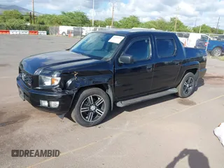 2013 Honda Ridgeline Sport with VIN 5FPYK1F70DB011814, listed as a IAAI auction lot 41689579 with 136,251 mi miles and . Bid and sale history available at DreamBid. Image 2.