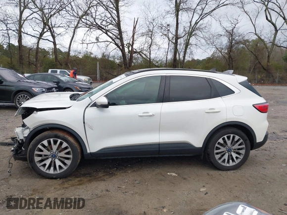 2020 Ford Escape Titanium Hybrid with VIN 1FMCU9DZ0LUC56274, listed as a IAAI auction lot 41256530 with 43,502 mi miles and . Bid and sale history available at DreamBid. Image 15.