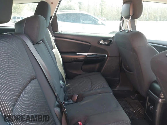 2014 Dodge Journey SE with VIN 3C4PDCABXET277723, listed as a IAAI auction lot 41709752 with 161,587 mi miles and . Bid and sale history available at DreamBid. Image 8.