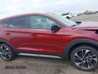 2019 Hyundai Tucson SEL with VIN KM8J33ALXKU855608, listed as a IAAI auction lot 41906199 with 52,741 mi miles. Bid and sale history available at carsss.com. Image 14.