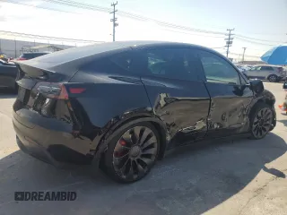 2022 Tesla Model Y Performance with VIN 7SAYGDEF6NF524171, listed as a Copart auction lot 60736945 with 30,629 mi miles and Salvage title. Bid and sale history available at DreamBid. Image 3.