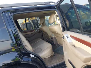 2012 Nissan Pathfinder LE with VIN 5N1AR1NN5CC607403, listed as a IAAI auction lot 41813677 with 217,854 mi miles. Bid and sale history available at carsss.com. Image 8.
