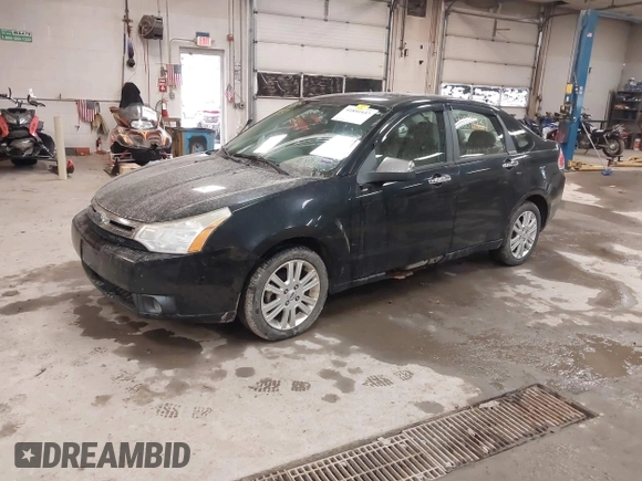 2010 Ford Focus SEL with VIN 1FAHP3HNXAW118514, listed as a IAAI auction lot 41891937 with 118,590 mi miles. Bid and sale history available at carsss.com. Image 2.