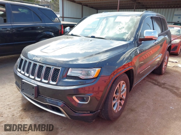 2015 Jeep Grand Cherokee Overland with VIN 1C4RJFCG6FC831641, listed as a IAAI auction lot 41877680 with 143,568 mi miles. Bid and sale history available at carsss.com. Image 17.