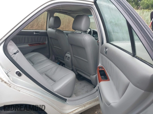 2002 Toyota Camry XLE z VIN JTDBF30K420083381, wystawiony jako IAAI lot #42368073 z przebiegiem 148 746 mil mil oraz . Historia ofert i sprzedaży dostępna na DreamBid. Obrazek 8.