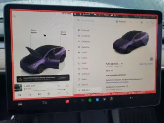 2025 Tesla Model Y Long Range z VIN 7SAYGDED9SF269767, wystawiony jako Copart lot #51588985 z przebiegiem 1 943 mil mil oraz Szkoda całkowita • Salvage title. Historia ofert i sprzedaży dostępna na DreamBid. Obrazek 9.