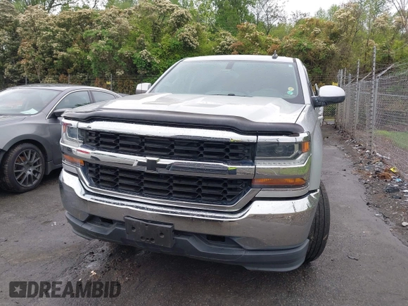 2018 Chevrolet Silverado 1500 LT with VIN 1GCVKREC7JZ151678, listed as a IAAI auction lot 41972011 with 106,892 mi miles and . Bid and sale history available at DreamBid. Image 12.