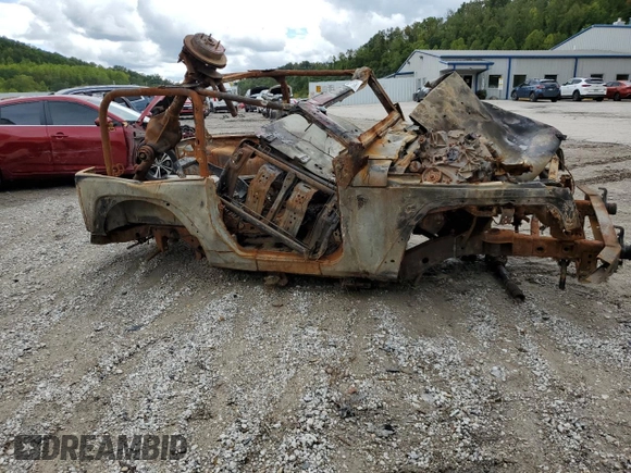 2007 Jeep Wrangler Sahara with VIN 1J4FA541X7L219977, listed as a Copart auction lot 73509754 with Not provided miles and Salvage title. Bid and sale history available at DreamBid. Image 4.