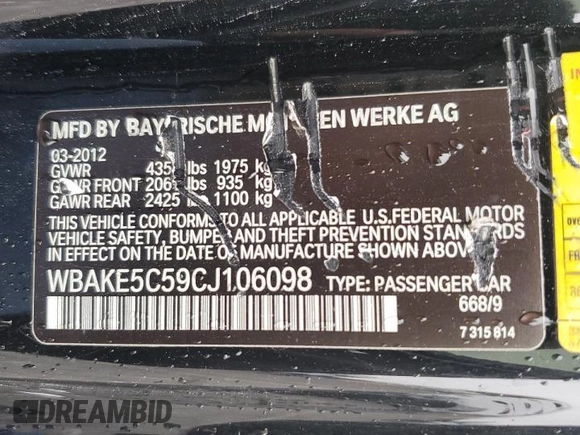 2012 BMW 3 Series 328i with VIN WBAKE5C59CJ106098, listed as a Copart auction lot 51977925 with 136,275 mi miles and Salvage title. Bid and sale history available at DreamBid. Image 12.