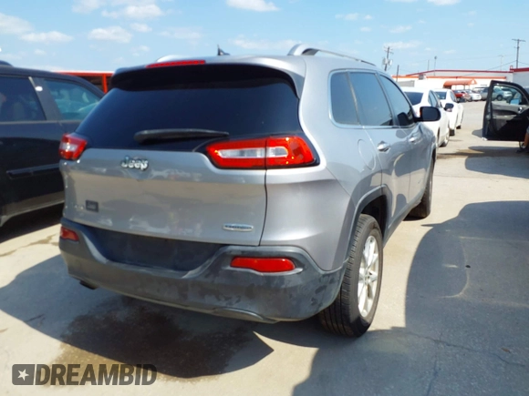 2014 Jeep Cherokee Latitude with VIN 1C4PJMCB4EW315520, listed as a IAAI auction lot 42034989 with 215,758 mi miles and . Bid and sale history available at DreamBid. Image 4.