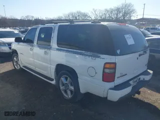 2003 GMC Yukon XL Denali with VIN 1GKFK66UX3J148600, listed as a IAAI auction lot 41712412 with NaN miles. Bid and sale history available at carsss.com. Image 3.