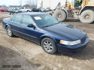1999 Cadillac Seville Touring STS with VIN 1G6KY5493XU913994, listed as a IAAI auction lot 41780695 with 60,375 mi miles. Bid and sale history available at carsss.com. Image 1.