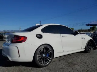 2017 BMW M2 with VIN WBS1H9C31HV887767, listed as a Copart auction lot 81957614 with 53,284 mi miles and Salvage Title. Bid and sale history available at carsss.com. Image 3.