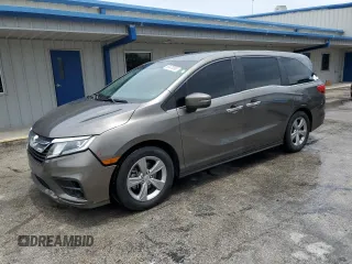 2018 Honda Odyssey EX z VIN 5FNRL6H5XJB017330, wystawiony jako Copart lot #63470395 z przebiegiem 121 827 mil mil oraz Szkoda całkowita • Salvage title. Historia ofert i sprzedaży dostępna na DreamBid. Obrazek 1.