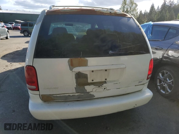 1996 Dodge Caravan SE z VIN 1B4GP45R8TB509090, wystawiony jako Copart lot #73795694 z przebiegiem Nie podano mil oraz Szkoda całkowita • Salvage title. Historia ofert i sprzedaży dostępna na DreamBid. Obrazek 6.