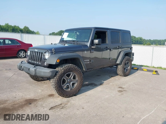 2018 Jeep Wrangler Unlimited Sport S with VIN 1C4BJWDG6JL854359, listed as a IAAI auction lot 42423170 with 84,470 mi miles and . Bid and sale history available at DreamBid. Image 2.