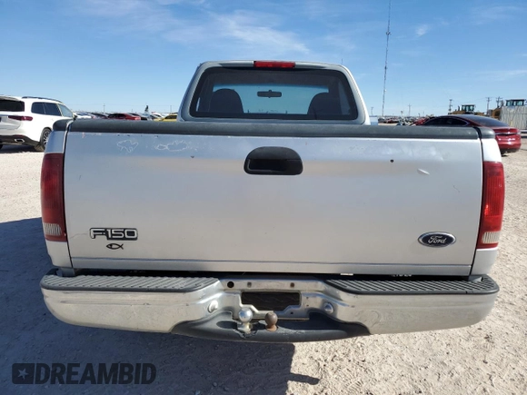 1998 Ford F-150 z VIN 1FTZF1762WKA87421, wystawiony jako Copart lot #86973334 z przebiegiem 217 978 mil mil oraz Szkoda całkowita • Salvage title. Historia ofert i sprzedaży dostępna na DreamBid. Obrazek 6.