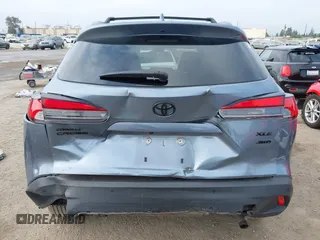2022 Toyota Corolla Cross XLE with VIN 7MUDAABG6NV007009, listed as a IAAI auction lot 42409061 with 37,178 mi miles and . Bid and sale history available at DreamBid. Image 17.