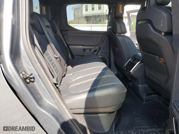 2022 Rivian R1T Adventure Package with VIN 7FCTGAAA7NN015041, listed as a Copart auction lot 70955194 with 45,469 mi miles and Salvage Title. Bid and sale history available at carsss.com. Image 10.