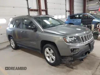2014 Jeep Compass Sport with VIN 1C4NJDBB5ED567863, listed as a IAAI auction lot 41704644 with 163,405 mi miles. Bid and sale history available at carsss.com. Image 1.