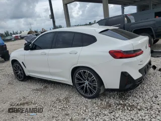 2024 BMW X4 M40i with VIN 5UX43DT02R9X54021, listed as a Copart auction lot 80482964 with 7,657 mi miles and Salvage Title. Bid and sale history available at carsss.com. Image 2.