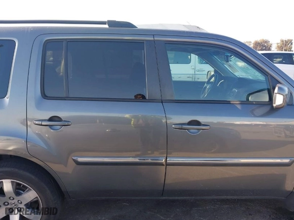2013 Honda Pilot Touring with VIN 5FNYF4H91DB071016, listed as a IAAI auction lot 41831906 with 203,249 mi miles. Bid and sale history available at carsss.com. Image 13.