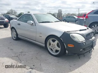 1999 Mercedes-Benz SLK-Class with VIN WDBKK47F1XF086736, listed as a IAAI auction lot 41580240 with 56,822 mi miles. Bid and sale history available at carsss.com. Image 1.