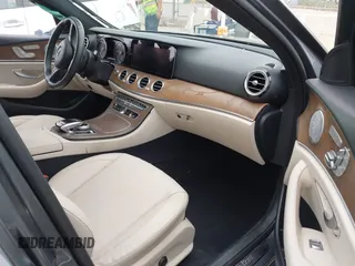 2018 Mercedes-Benz E 300 with VIN WDDZF4JBXJA477047, listed as a IAAI auction lot 42075763 with 62,843 mi miles and . Bid and sale history available at DreamBid. Image 5.