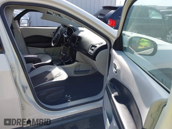 2021 Jeep Compass Latitude with VIN 3C4NJCBBXMT563942, listed as a IAAI auction lot 42045108 with 166,153 mi miles and . Bid and sale history available at DreamBid. Image 5.