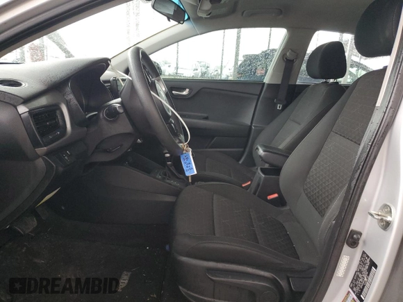 2020 Kia Rio S with VIN 3KPA24ADXLE298706, listed as a Copart auction lot 47620455 with 61,274 mi miles and Salvage Title. Bid and sale history available at DreamBid. Image 7.