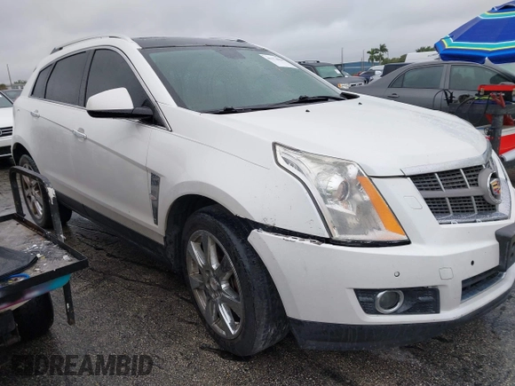 2012 Cadillac SRX Performance Collection with VIN 3GYFNEE33CS528697, listed as a IAAI auction lot 41374060 with 157,319 mi miles and . Bid and sale history available at DreamBid. Image 12.