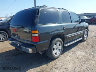 2004 Chevrolet Tahoe LT with VIN 1GNEC13ZX4R102265, listed as a IAAI auction lot 41812826 with 255,239 mi miles. Bid and sale history available at carsss.com. Image 4.